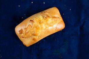 Beef Roll isolated on blue background top view of savory snack food photo