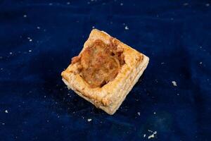 Tandoori Chicken Cheese puff isolated on blue background top view of savory snack food photo