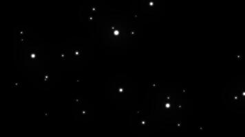 bianca raggiante particelle effetto sovrapposizione. particelle su nero sfondo. galleggiante particelle effetto. video