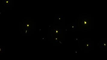 Animation of Gold Glow Particles Falling on Black Background. Sparks on a black background video