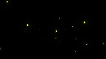 Animation of Gold Glow Particles Falling on Black Background. Sparks on a black background video