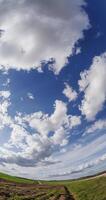 vertical timelapse of sky background with tiny fluffy clouds in windy day on fisheye lens spherical view video