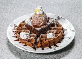 brownie waffle with ice cream scoop served in dish isolated on background top view of hong kong dessert food photo