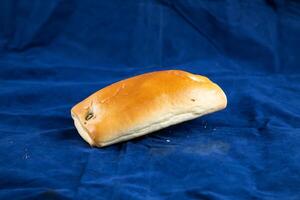 Chicken Roll isolated on blue background top view of savory snack food photo