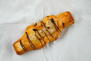 Apple Danish served isolated on grey background side view of french breakfast baked food item photo