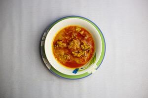 Khashir Moong Dal gosht served in plate isolated on background top view of bangladeshi, indian and pakistani traditional spicy food photo