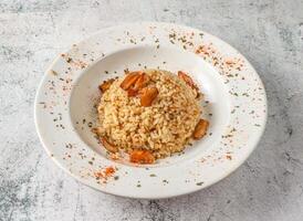 Garlic rice served in isolated on grey background top view of singaporean food photo