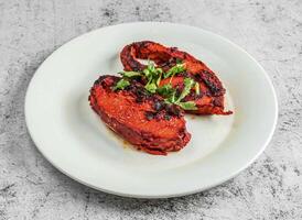 Tawa fish fry cutlets served in dish isolated on background top view of desi indian food photo