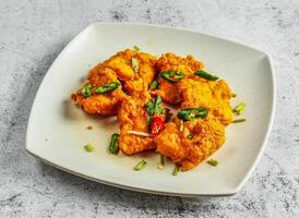 Fried fish cutlets cake served in dish isolated on background top view of desi indian food photo