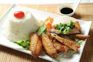 Vietnamese Sambo Rice with sauce served in dish isolated on table top view of meal photo