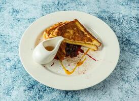 french toast breakfast served in plate isolated on background top view of italian food photo