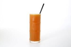 Hurricane cocktail and straw served in glass isolated on grey background side view of healthy morning arabic drink photo