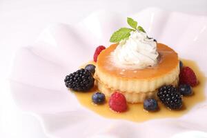 CLASSIC CREAM CARAMEL Pudding Cake served in dish isolated background side view of arabic dessert bake food photo