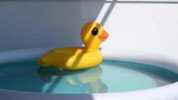 Empty inflatable rubber duck floating on pool water on hot summer vacation day. View of crystal clean water surface, sun shine bright water-pool looping slow motion background video