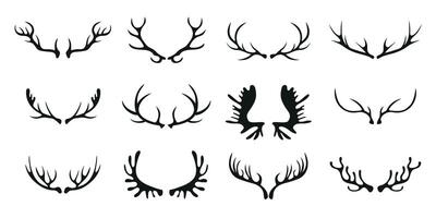 Black silhouettes of different deer horns on white. Deer antlers. Collection of elements on the theme of of hunting, tourism and environment. vector