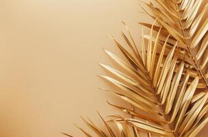 Golden Palm Leaf on Beige Background photo