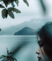 Mountain Overlooking Body of Water photo