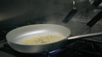 Frying Pan With Olive Oil Juice And Putting Black Ink Squid Spaghetti Pasta video