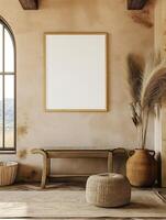 A mockup of a blank square photo frame hanging in the middle of wall with Southwestern, desert, earthy decoration.