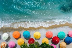 AI generated Top view of sea and colored sun umbrellas on sand beach photo