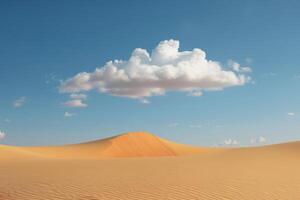 Solitary Cloud Above Sand Dune in Desert photo