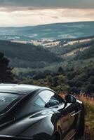 Modern Car Driving on Scenic Road With Mountains Ranges photo