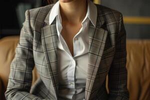 Confident businesswoman wearing business suit in office workspace photo