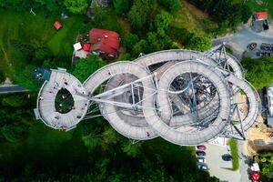 Sky Walk observation tower in mountains. Tourist attraction in Poland photo