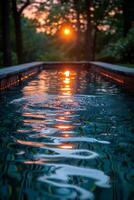 ai generado piscina reflejando puesta de sol resplandor foto