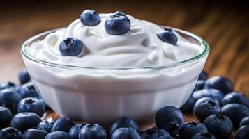 AI generated A fresh blueberry plunging into a sea of yogurt. Generative AI photo