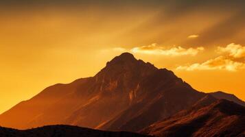 AI generated The silhouette of a mountain against a golden sky. Generative AI photo
