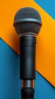 AI generated Black Microphone on Blue and Yellow Background photo