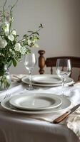 AI generated Elegant Table Setting With White Plate, Silverware, and Flowers photo