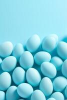 AI generated easter eggs on a blue background for your commercial or promotional projects photo