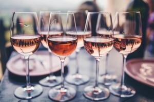AI generated Row of Wine Glasses on Bar Counter photo