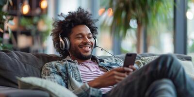 AI generated Man Sitting on Couch With Headphones Using Cell Phone photo