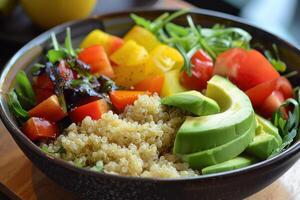 AI generated A colorful salad featuring quinoa, roasted vegetables, avocado, and a zesty lemon vinaigrette photo