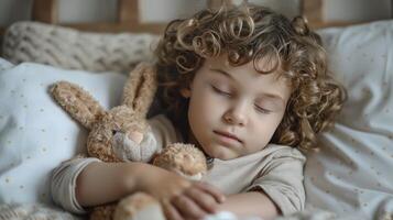 AI generated A little curly-haired boy of six years old sleeps in his crib, clutching a stuffed bunny photo