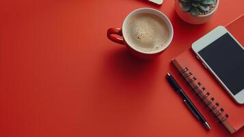 ai generado rojo escritorio con ordenador portátil y café taza foto