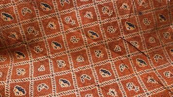 Traditional batik native to Pekalongan, Central Java, Indonesia with elegant classic motifs photo