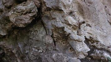 Rough Gray Stone Or Rock Texture Of Mountains, Background And Copy Space For Text On Mountaineering photo