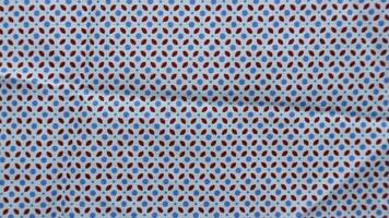 Geometric ethnic pattern made with straw in black and white. knitting fabric pattern for background photo