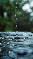 AI generated Water Drop Close Up With Trees in Background photo