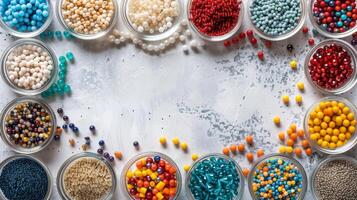 Group of Bowls Filled With Different Colored Beads photo
