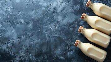 Three Bottles of Milk Arranged Side by Side photo