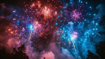 Colorful Fireworks Exploding in the Night Sky photo