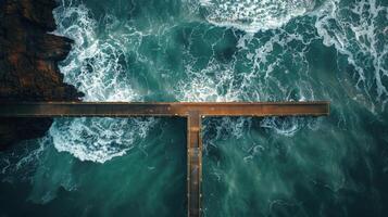 ai generado aéreo ver de el Oceano y muelle foto