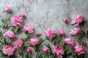 AI generated Creative layout of pink peony blossoms and foliage on a white concrete background photo