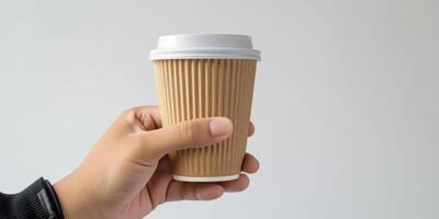 AI generated A persons hand gripping a brown paper coffee cup with a white lid, symbolizing urban lifestyle and eco-friendly choices photo