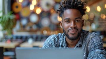 Man Sitting in Front of Laptop Computer photo